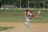 Ronny Carbo tries to block the ball as Rowe slides into 2nd