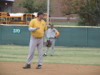 Jodie Wolfe checks the outfield with Johnny Houghton