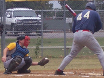 John DiGiacomo takes a pitch that Schak pulls in